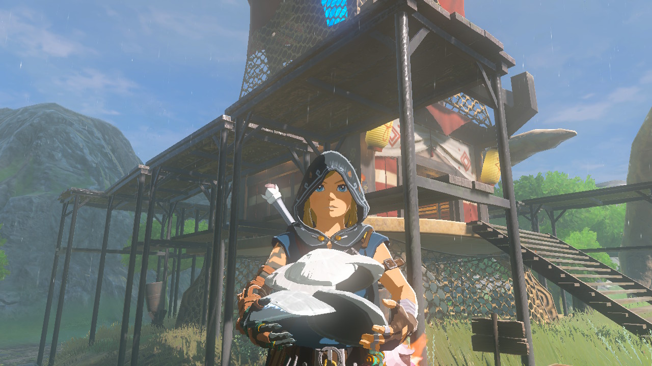 Link, wearing a hood, holds five dragon scales on his hands in Zelda: Tears of the Kingdom
