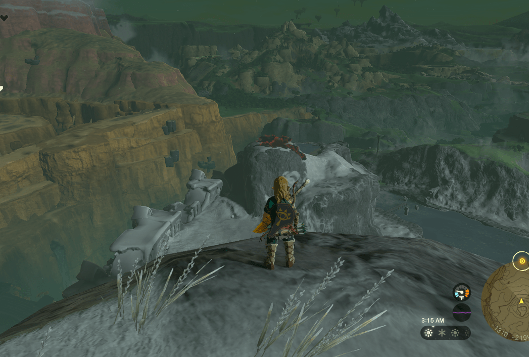 Link scales a snowy mountain during A Call From the Depths in Zelda Tears of the Kingdom.