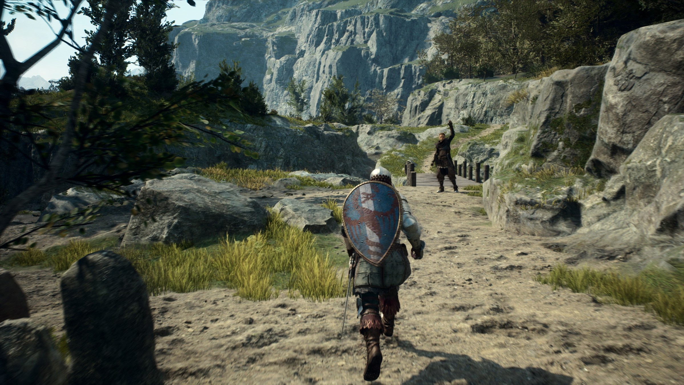 A Dragon’s Dogma 2 screenshot showing a fighter character, shield on their back, walking toward someone waving