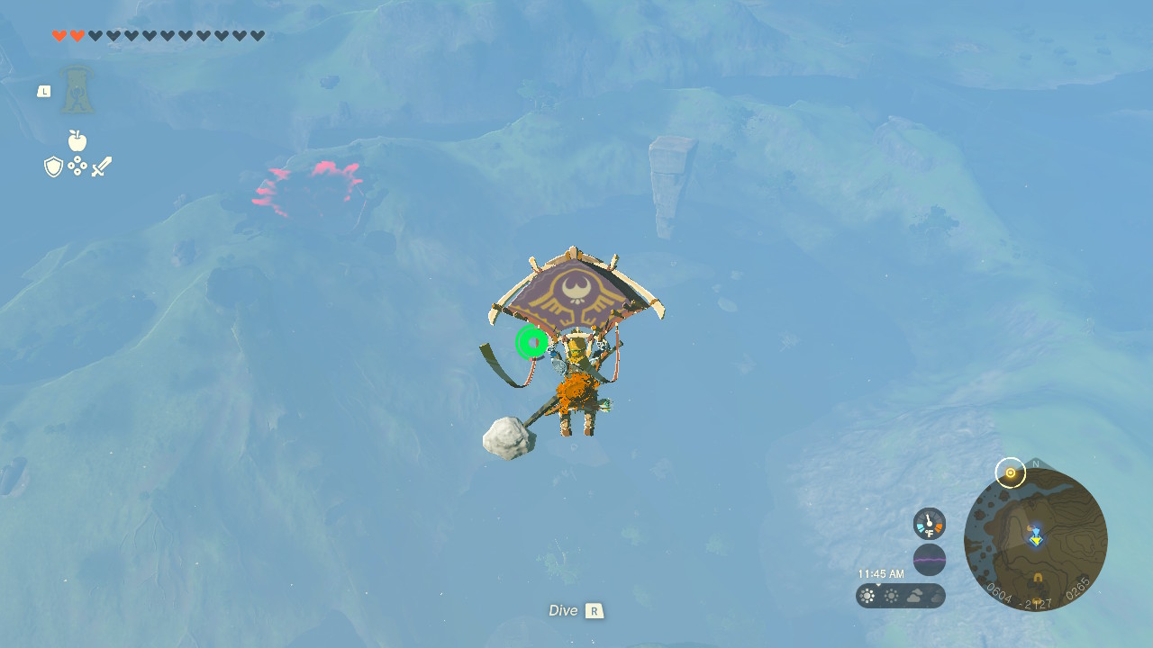 Link using his glider to soar toward a big stone