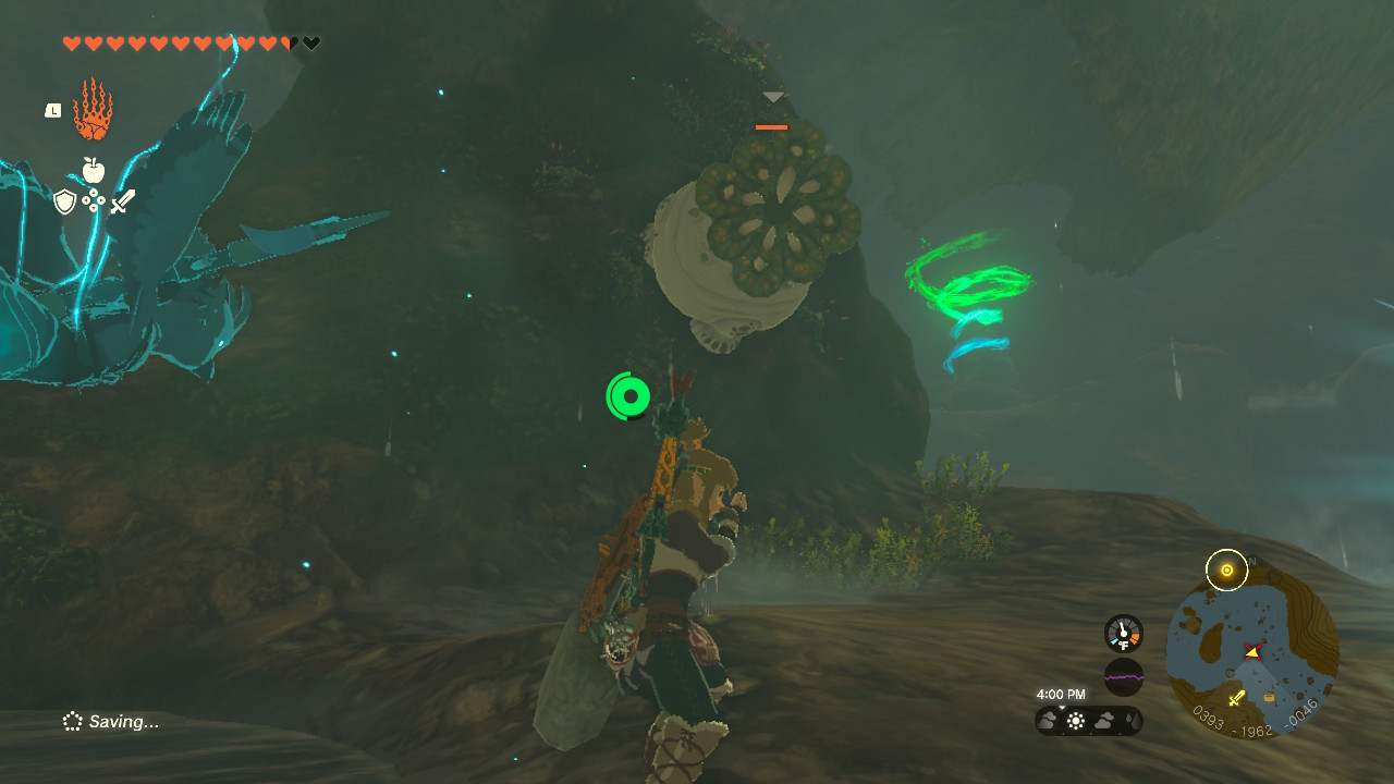 Link battling a Like Like, with a shrine in the background