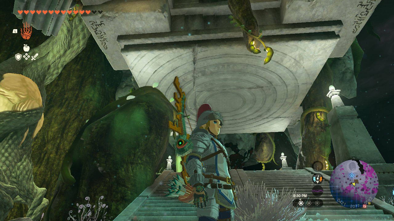 Link standing in front of a stone platform in the depths in Zelda: TOTK