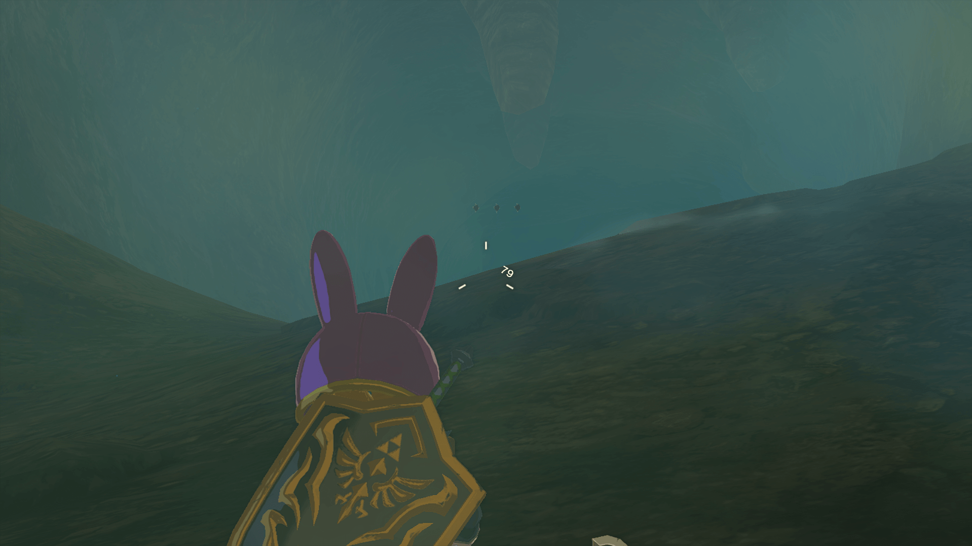 Three diamonds float in the air above a cliff in Tears of the Kingdom