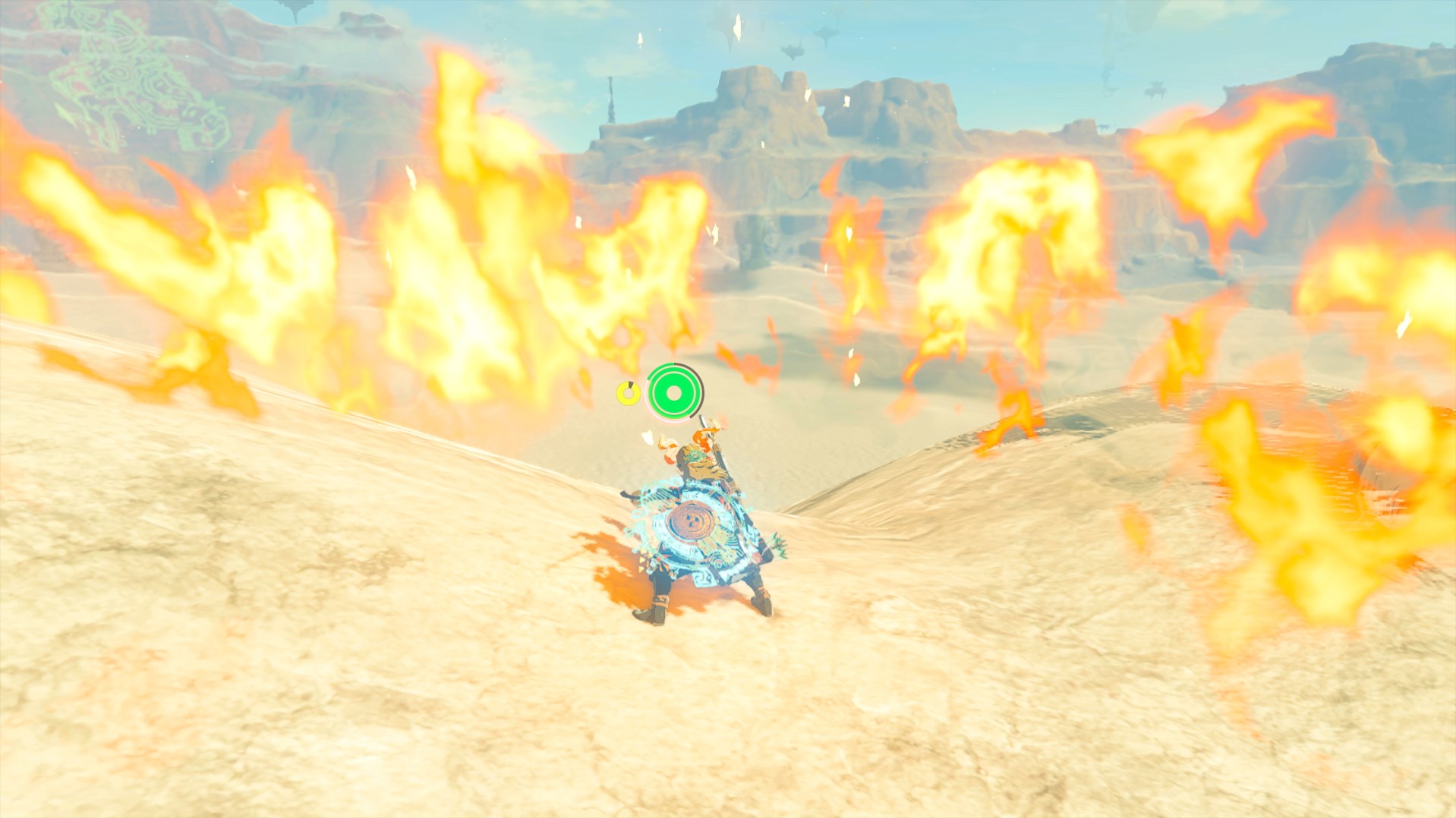 Link in the Ember Armor does a spin attack, releasing tons of fire in the Gerudo Desert in Tears of the Kingdom