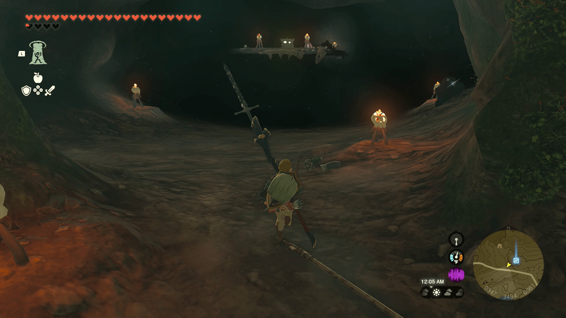 Link runs toward an unlocked chest on a wooden platform in the Deplian Badlands Cave