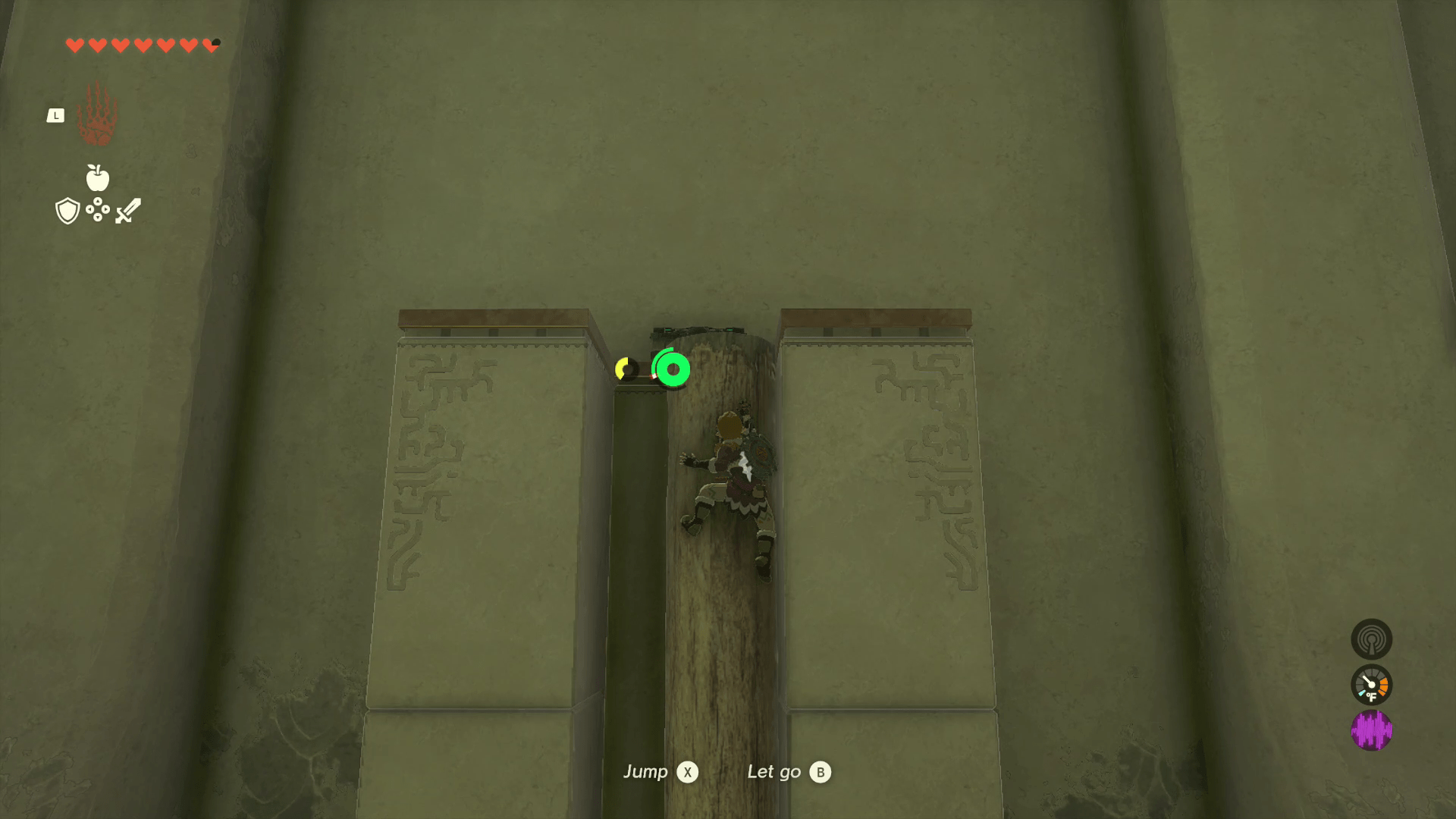 Link climbs up a log that’s been balanced in a divot on a platform that has a treasure chest at the top of it