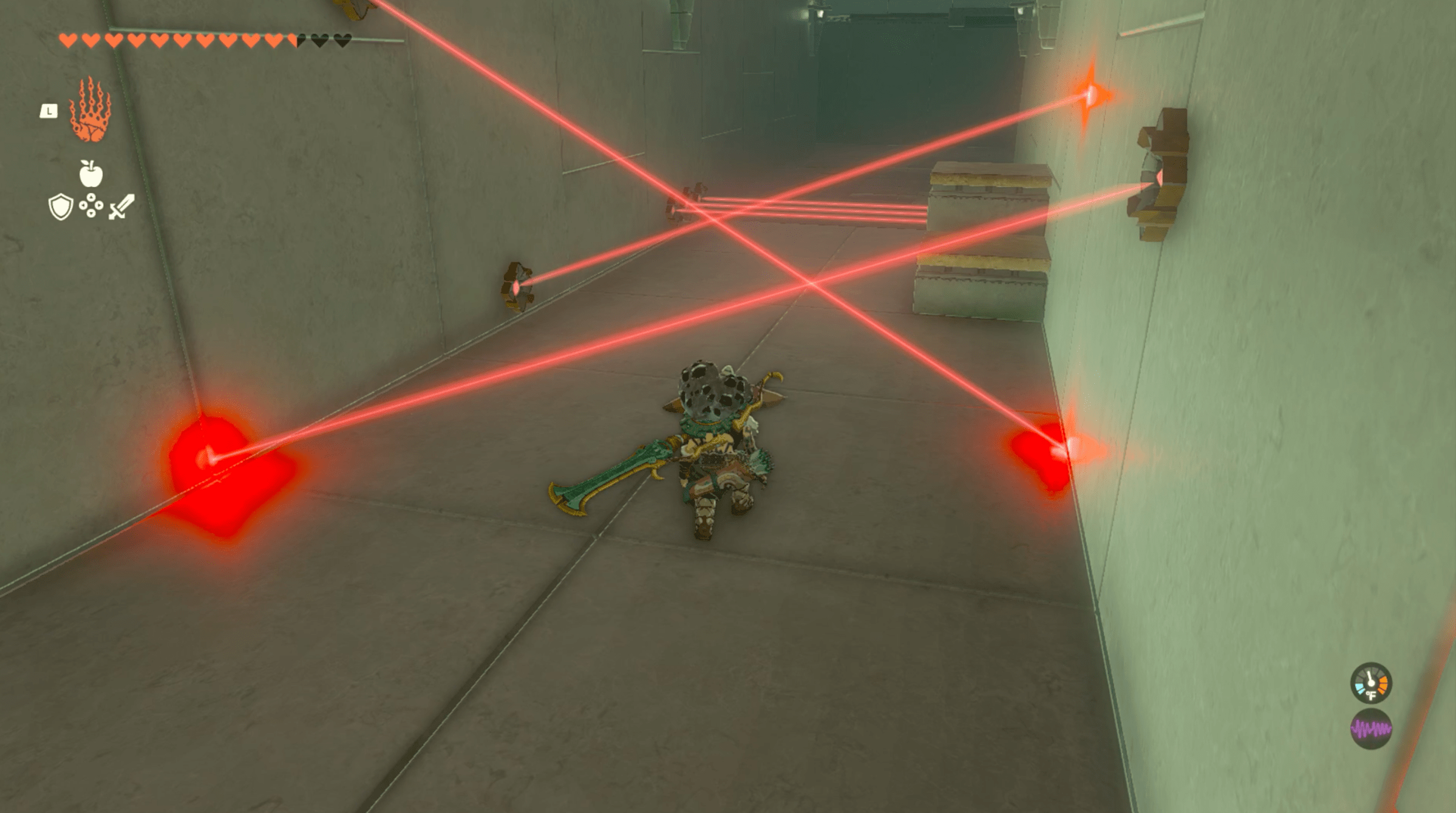 An image of a laser puzzle in Sahiro Shrine in The Legend of Zelda: Tears of the Kingdom. Link is crouching beneath res lasers pointing in different directions.
