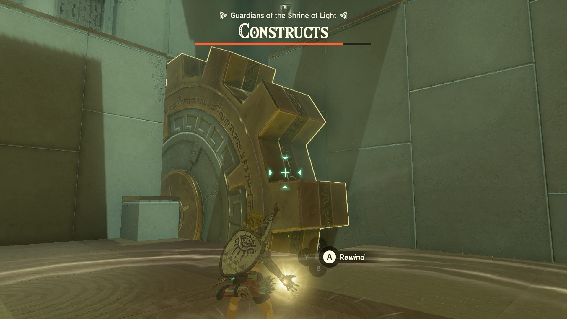 Link using Recall to rewind the large cog wheel inside of the Jojon Shrine to reach the next floor in The Legend of Zelda: Tears of the Kingdom.