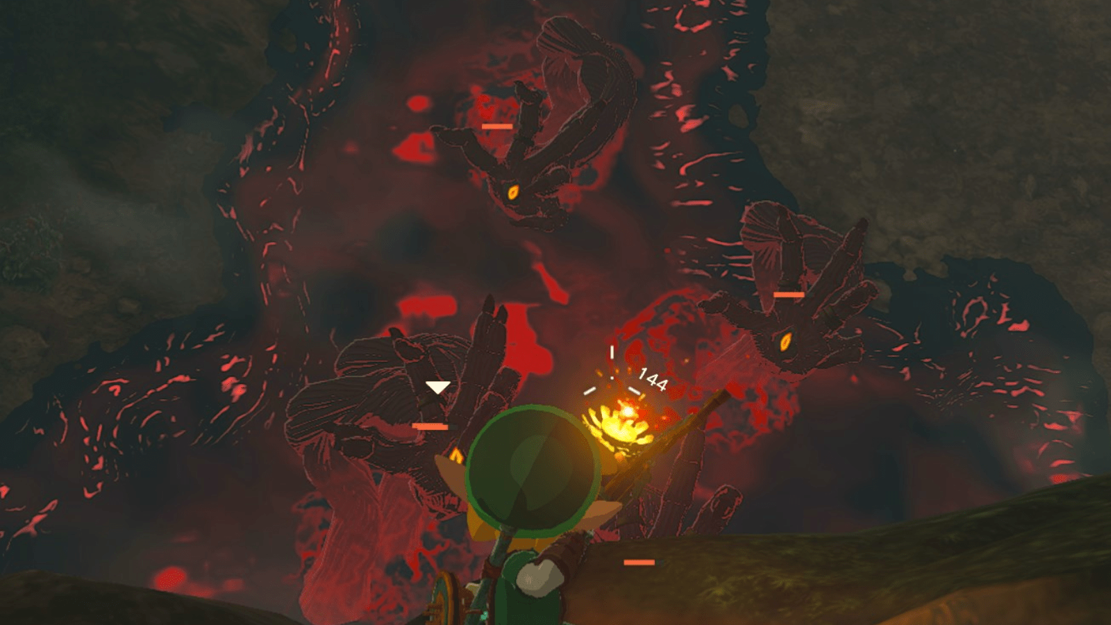 Link shoots a bomb arrow from higher ground into the middle of five Gloom Hands in The Legend of Zelda: Tears of the Kingdom