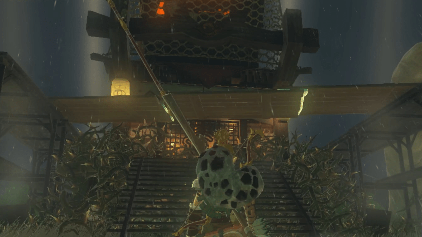 Link stands before the Rabella Wetlands Skyview Tower roof that was built out of wood using the Hudson Construction materials in The Legend of Zelda: Tears of the Kingdom