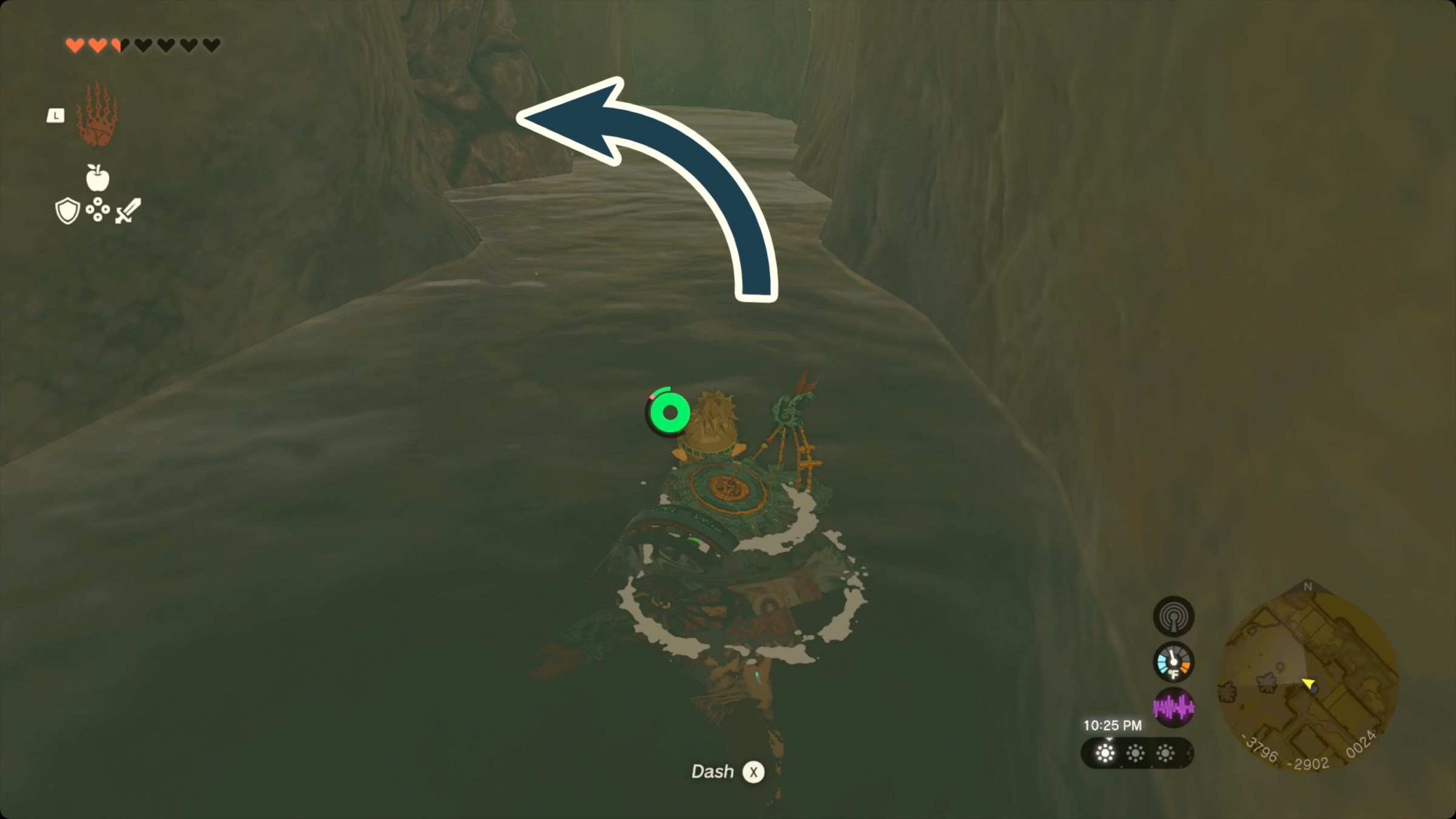 The Legend of Zelda: Tears of the Kingdom Link swimming through the tunnel below Fashion Passion in Gerudo Town. There’s a breakable wall on at the left.