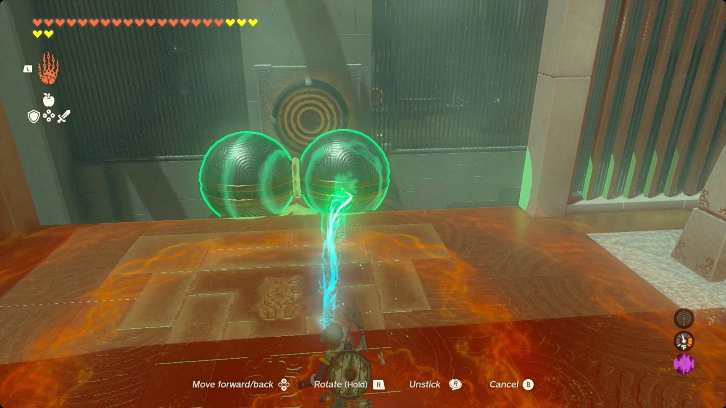 The Legend of Zelda: Tears of the Kingdom Link using Ultrahand to roll a pair of balls in a dumbbell shape down a ramp in Iun-orok Shrine.