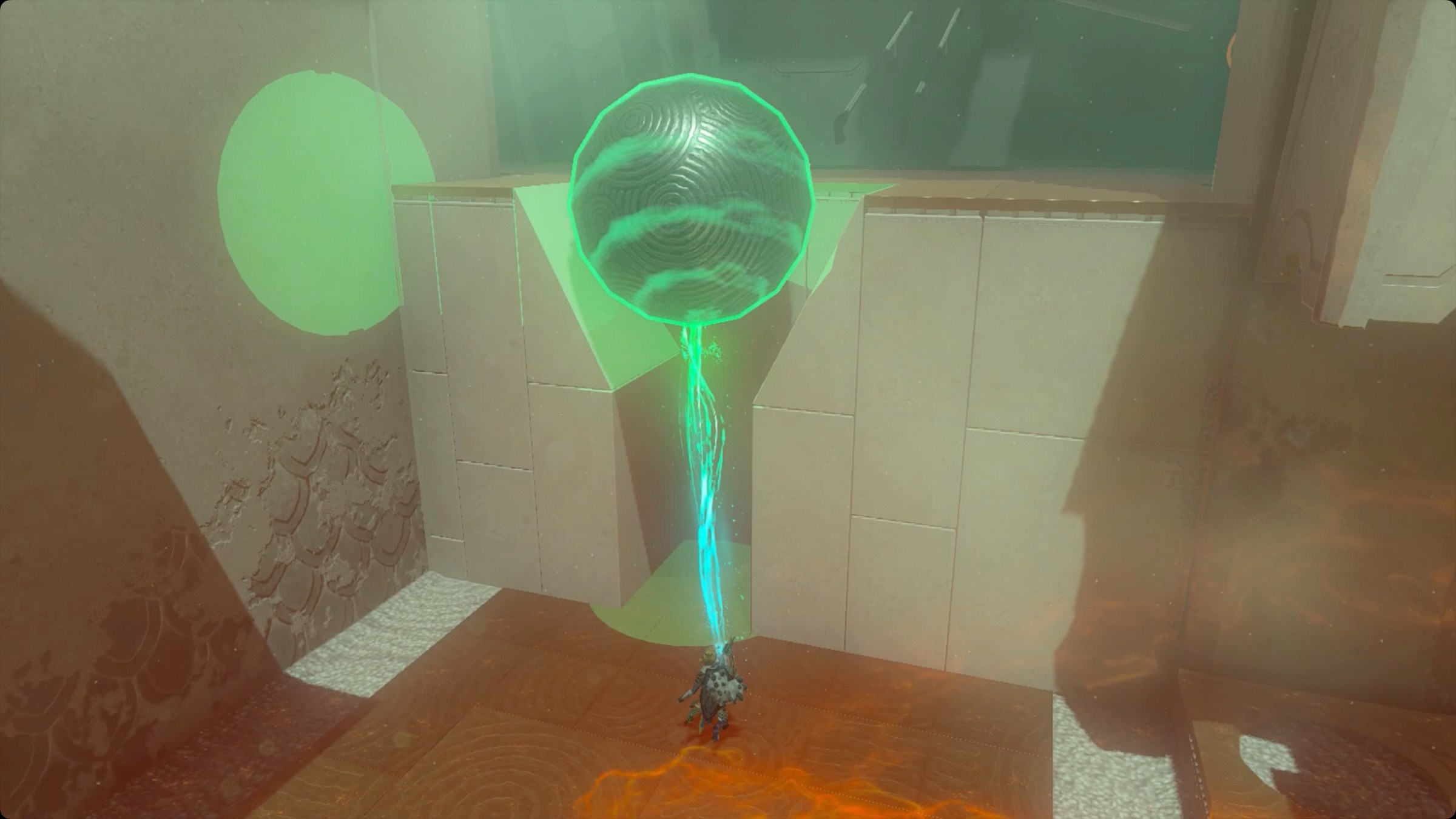 The Legend of Zelda: Tears of the Kingdom Link placing a large metal ball at the top of a funnel in Mayamats Shrine