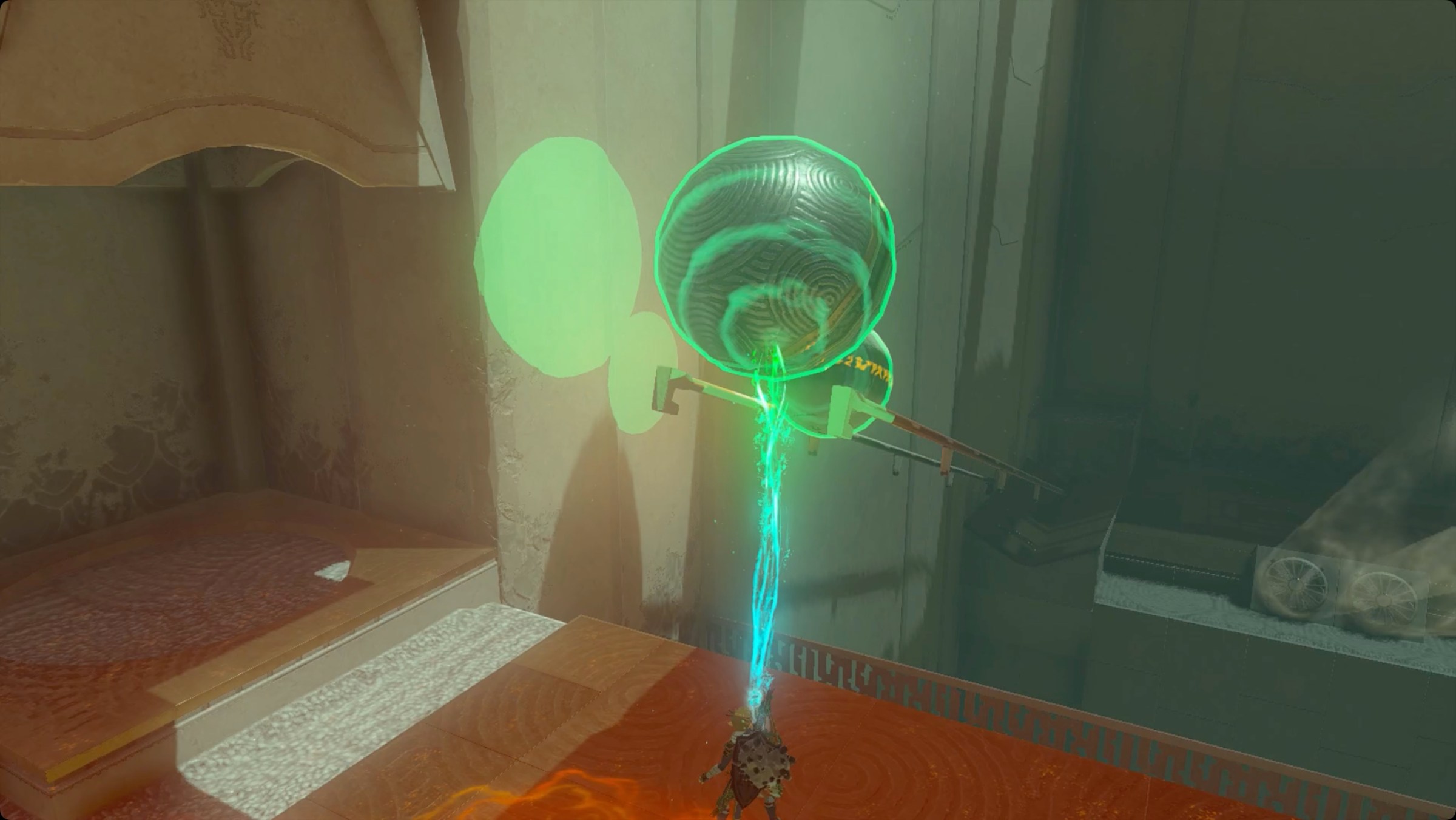 The Legend of Zelda: Tears of the Kingdom Link using Ultrahand to place a pair of metal balls on rails in Mayamats Shrine