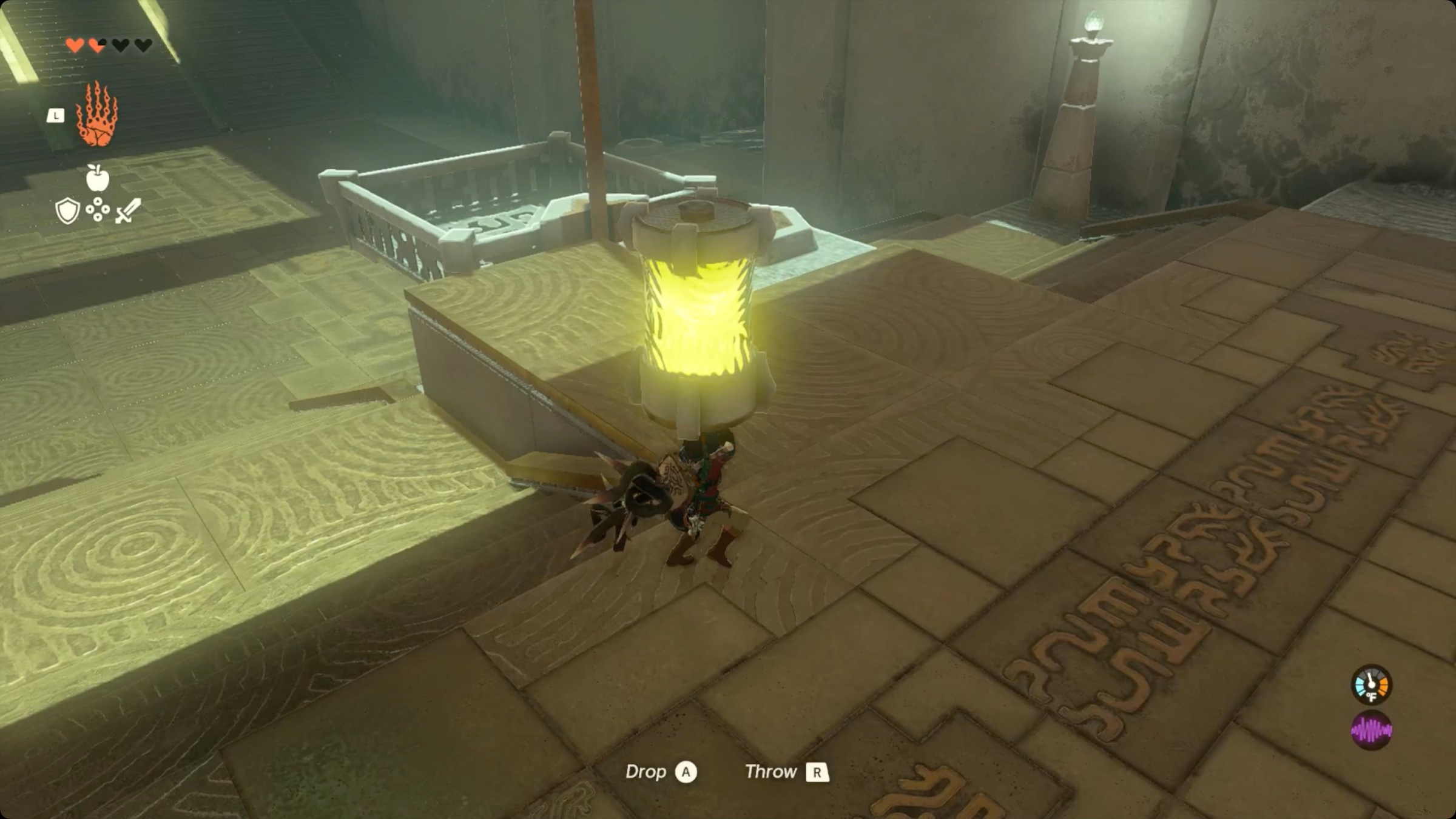 The Legend of Zelda: Tears of the Kingdom Link carrying a charged Zonai battery to a lift in Mogawak Shrine.