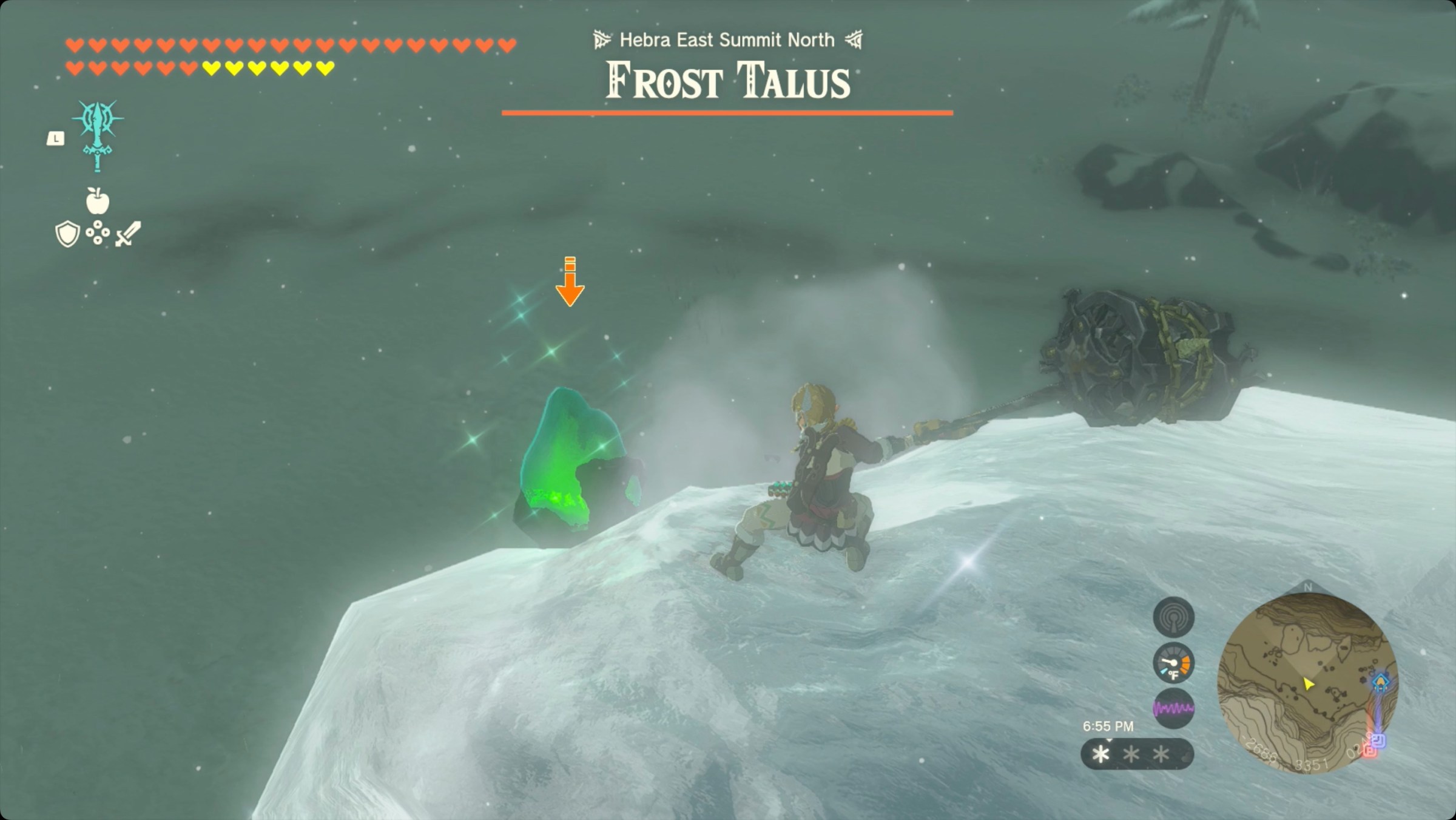 The Legend of Zelda: Tears of the Kingdom Link using a large hammer to attack the crystal on top of a Frost Talus.