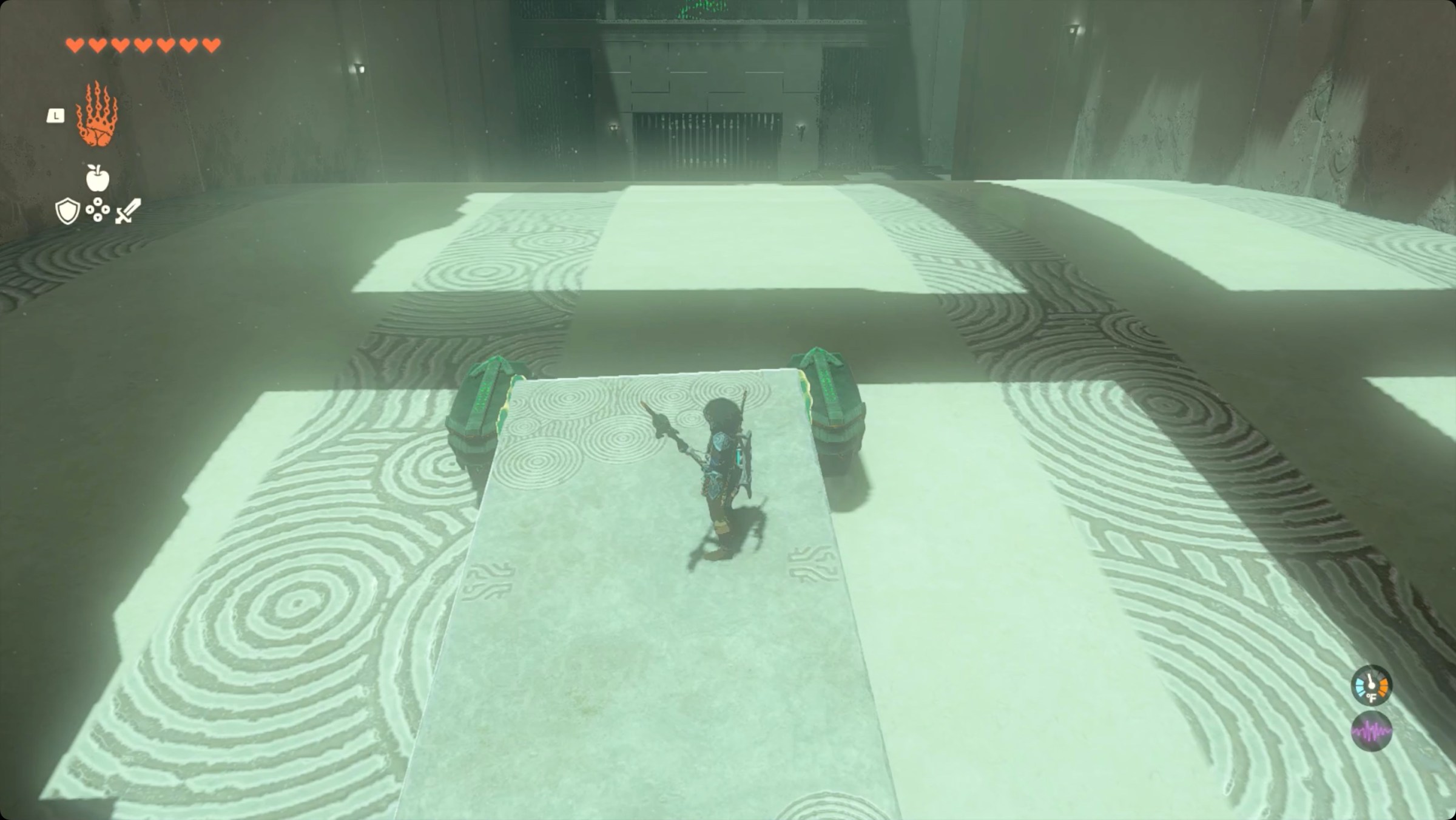 The Legend of Zelda: Tears of the Kingdom - Link riding a Zonai cart across a conveyor belt.
