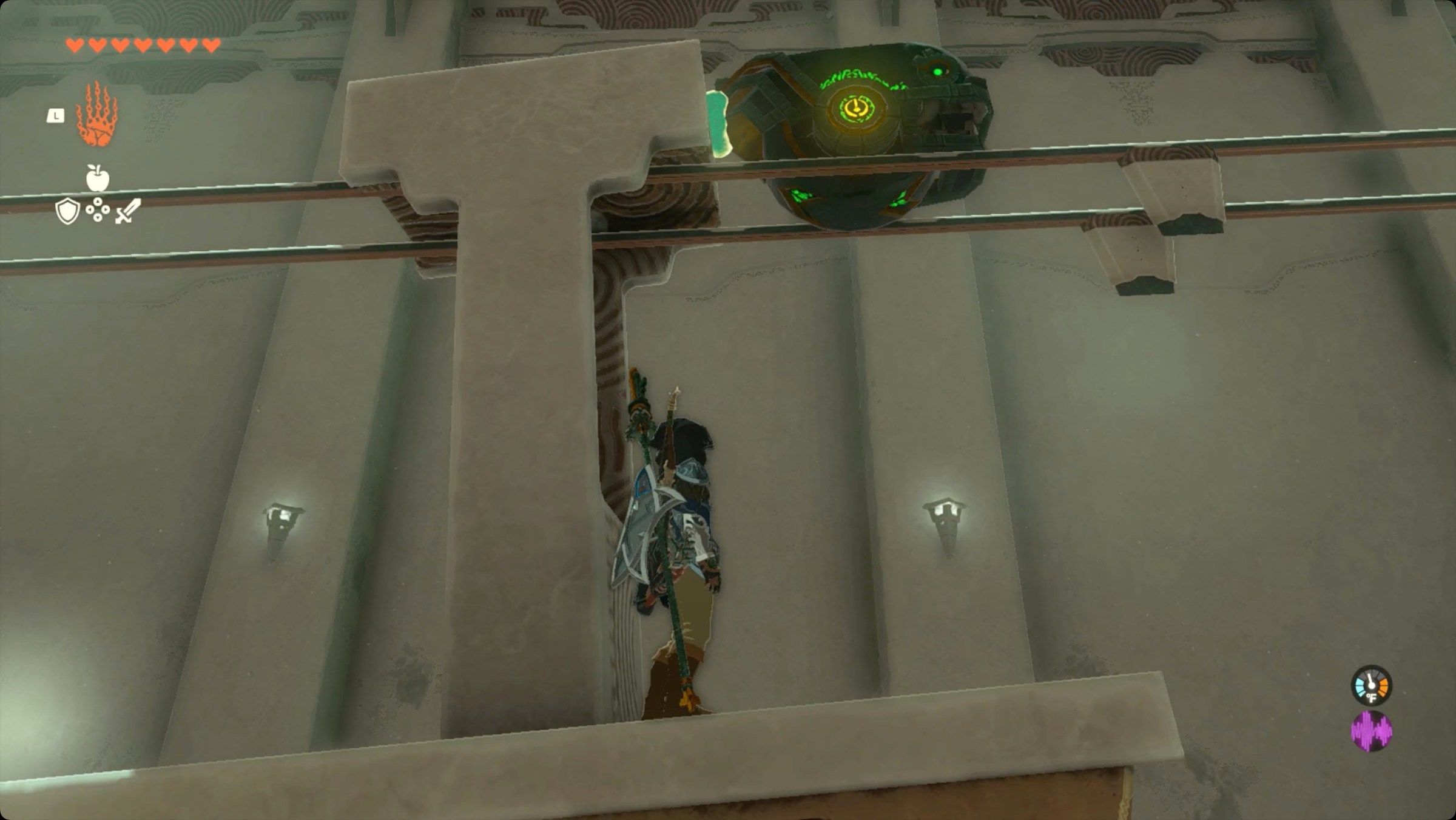 The Legend of Zelda: Tears of the Kingdom - Link riding a cart across a rail with a motor pulling him along.