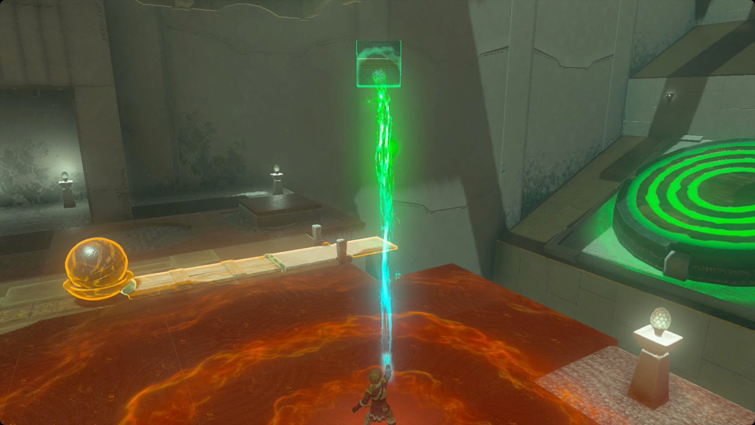 The Legend of Zelda: Tears of the Kingdom Link preparing to launch a ball off of an extended catapult in Wao-os Shrine