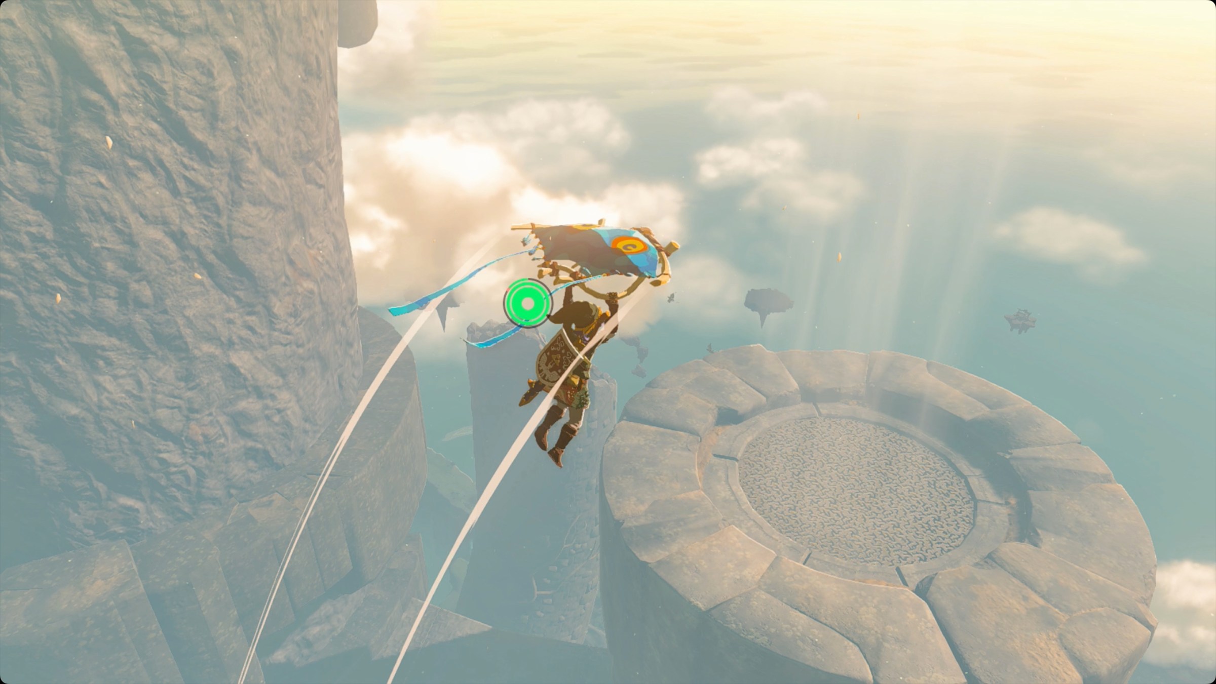The Legend of Zelda: Tears of the Kingdom Link using the paraglider to travel between the fan towers on Zonaite Forge Island