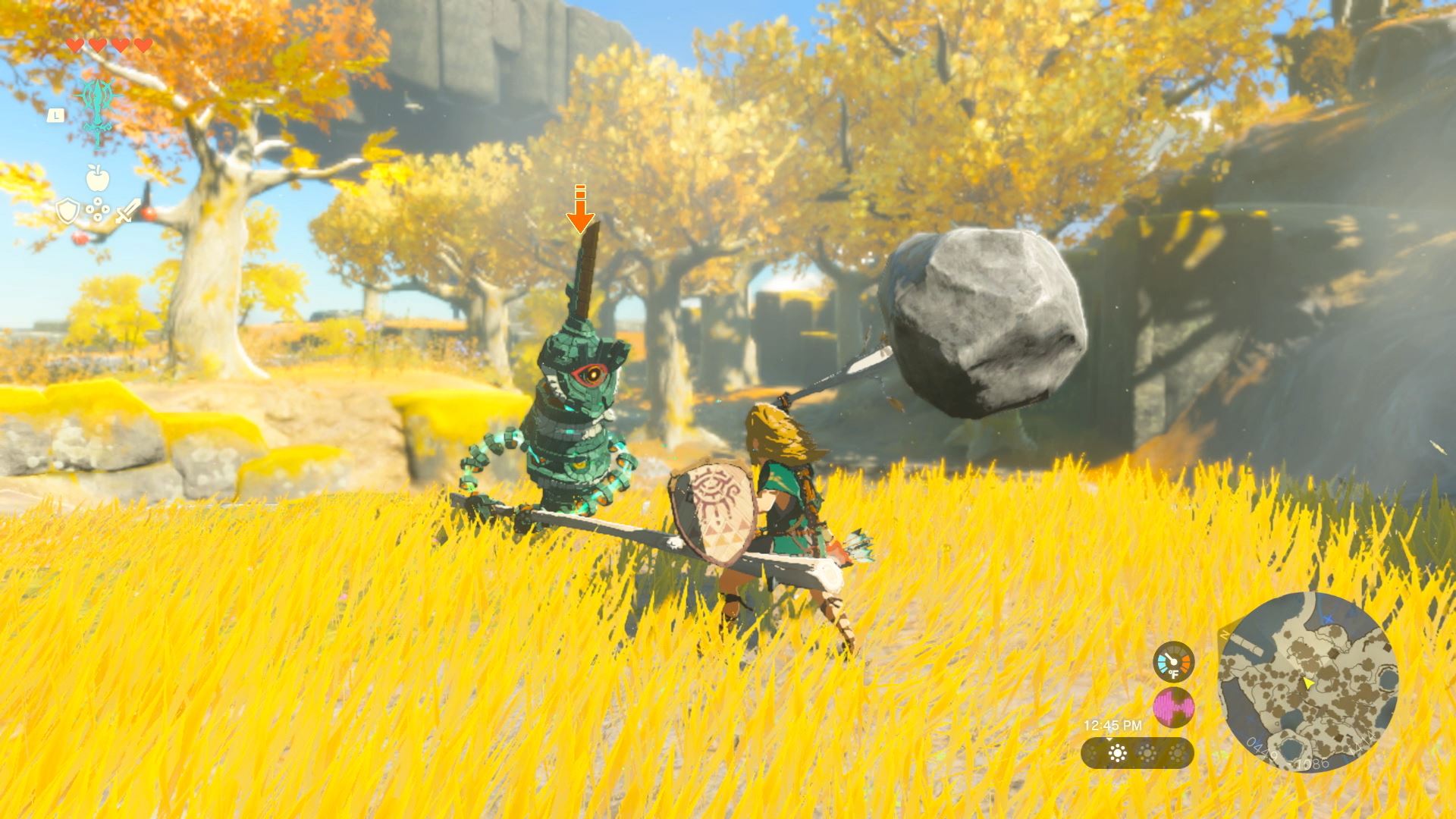An image of Link in The Legend of Zelda: Tears of the Kingdom swinging a stick fused with a rock.