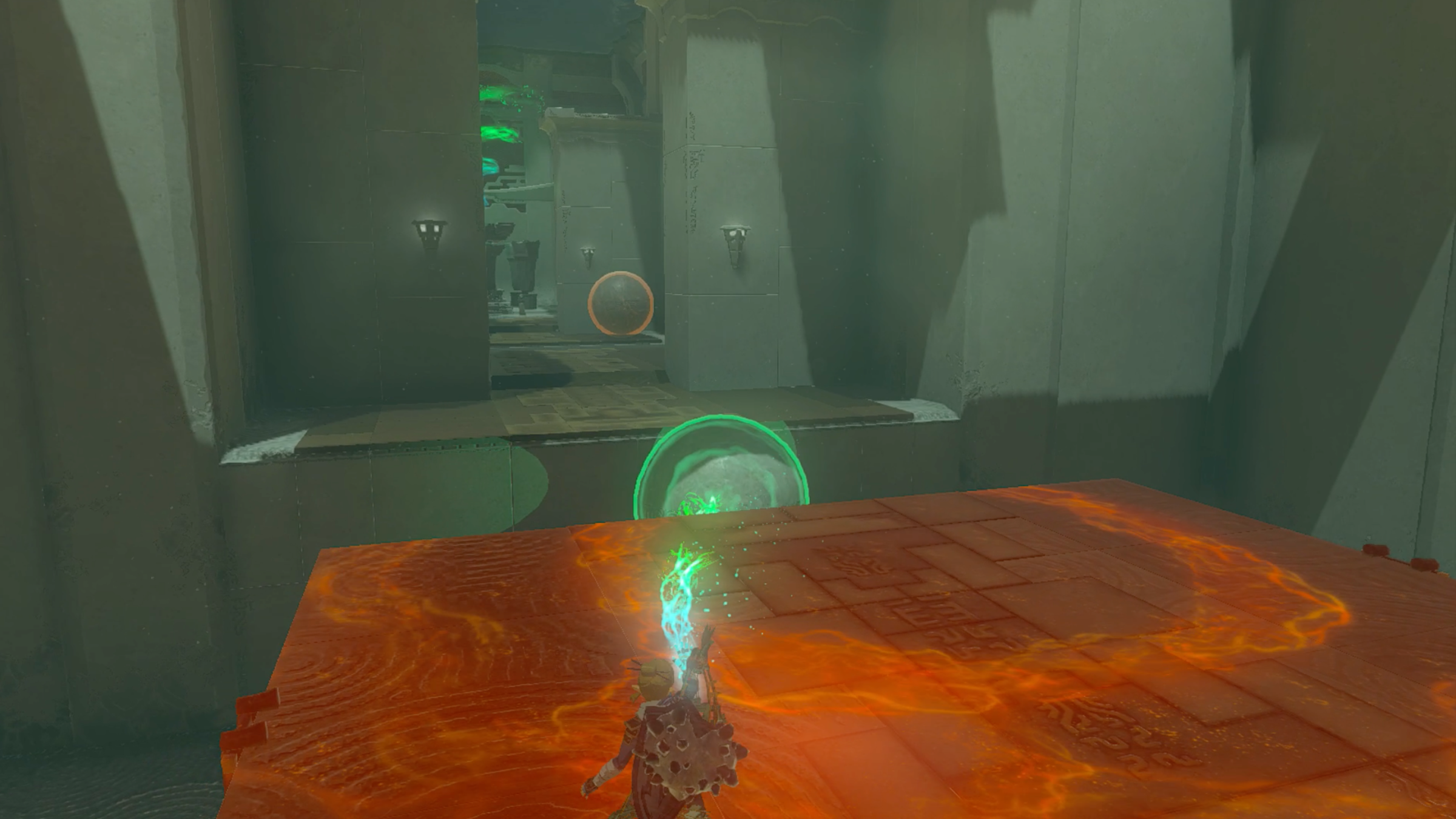 Link using Ultrahand to move a giant ball in a shrine in The Legend of Zelda: Tears of the Kingdom.