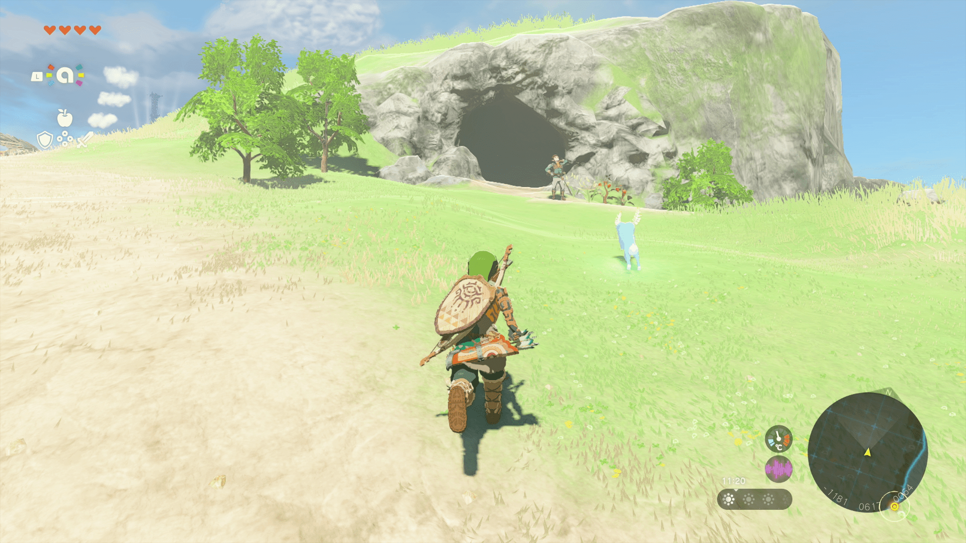 Link following a blupee to a cave