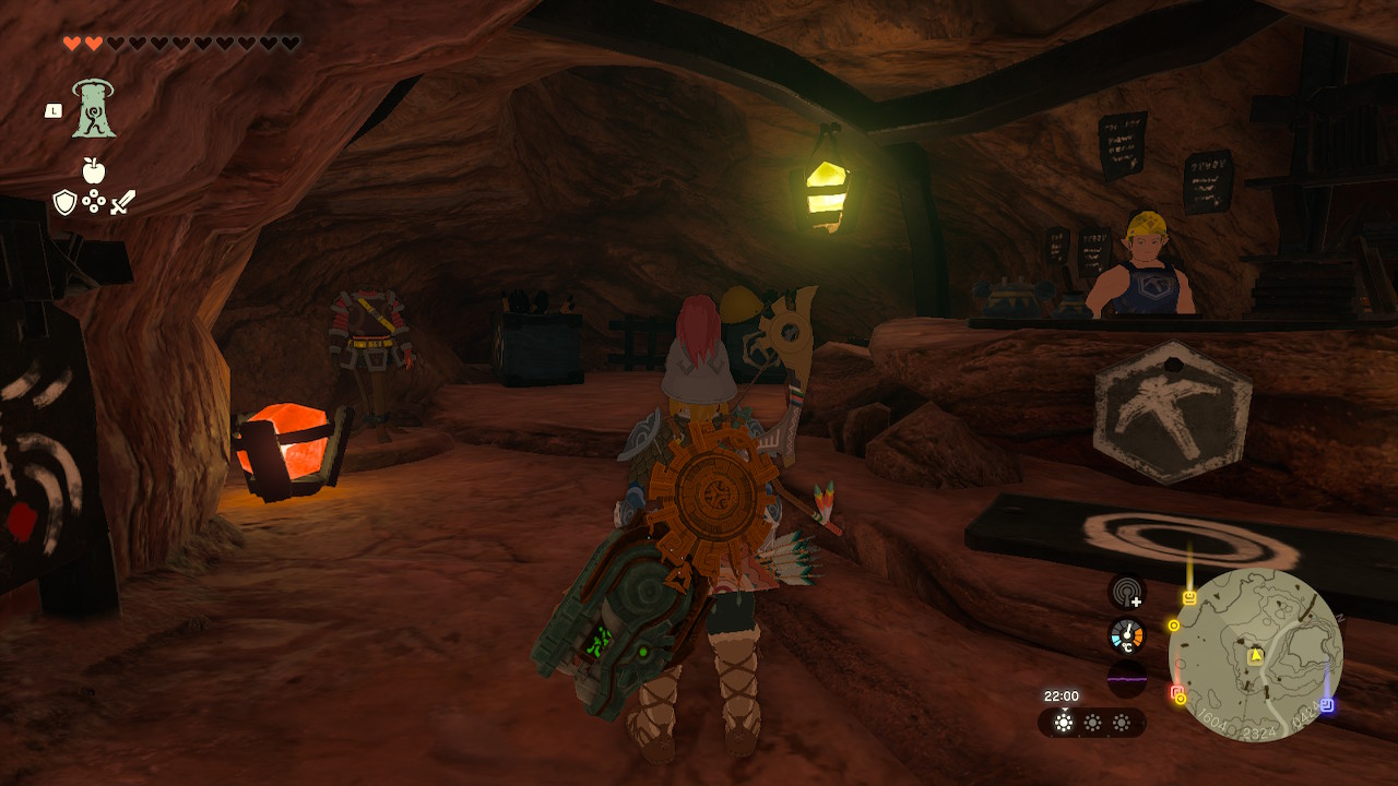 Link stands near a shop selling the flamebreaker armor in Zelda Tears of the Kingdom.