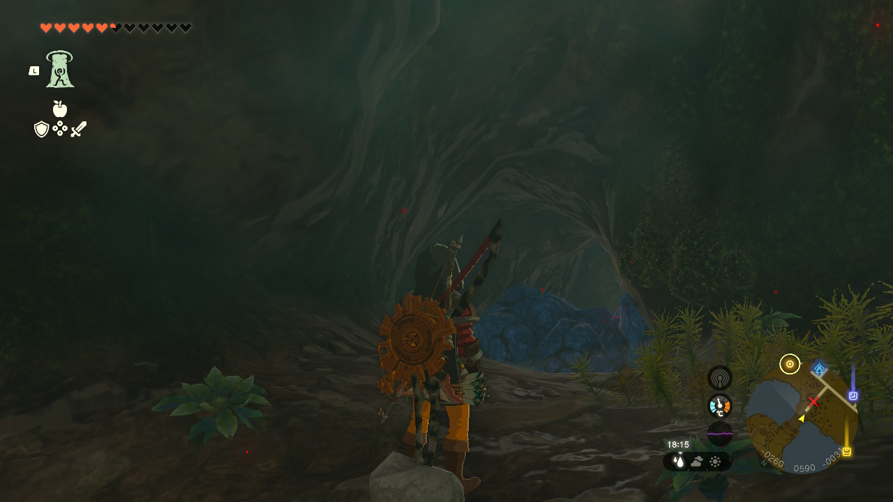 Link clears a pile of blue rubble in a cave while looking for the Soldier’S Armor in Zelda Tears of the Kingdom.