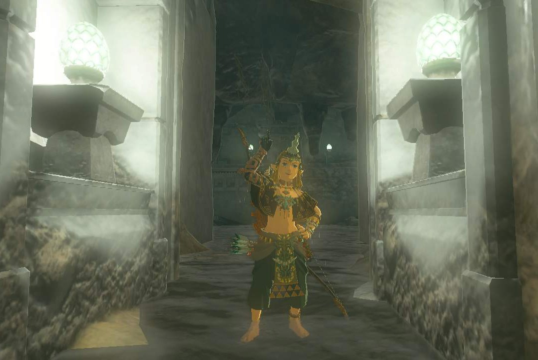 Link wears the Charged Armor while standing in a lit hallway in Zelda Tears of the Kingdom.