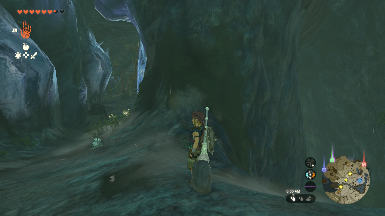 Link stands on the other side of the cave, next to a path that leads to the chest room in Zelda: Tears of the Kingdom