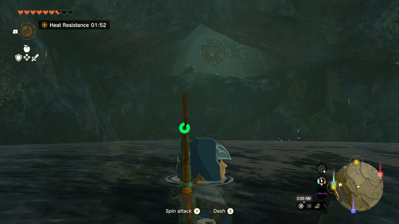 Link floats in a pool of water while a Like Like overlooks from a gap in the cave in Zelda: Tears of the kingdom