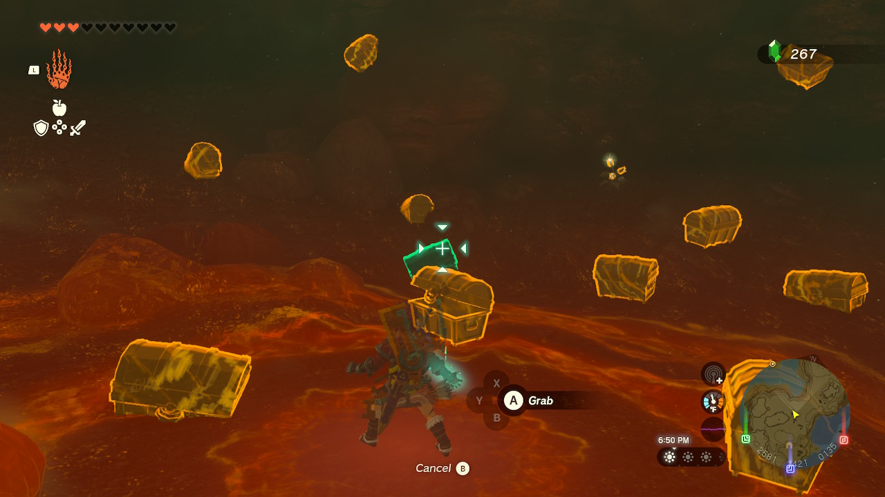 Link uses Ultrahand and aims at a chest in the far end of the cave, which is stuck in the ground, in Zelda: Tears of the Kingdom