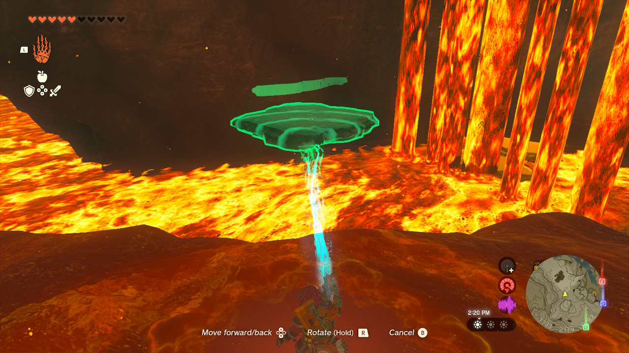 Link uses Ultrahand to move a rock platform to the other side of the lava river in Zelda: Tears of the Kingdom