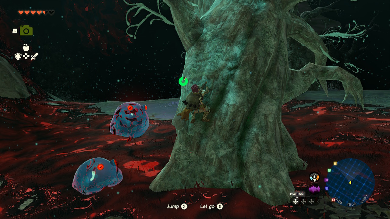 Link climbs a tree in The Depths to avoid touching gloom on the ground as two Chuchu Jellys approach him in Zelda: Tears of the Kingdom