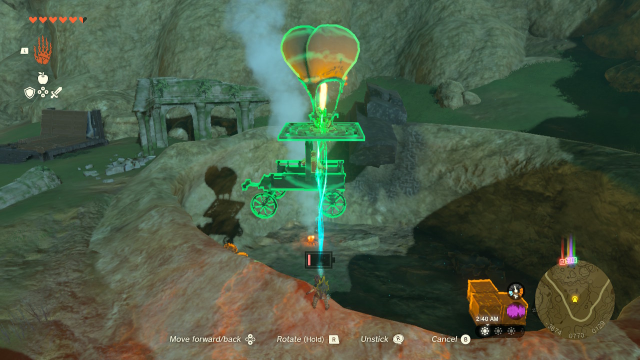 Link uses Ultrahand to move Eustus wagon outside of the hole in Zelda: Tears of the Kingdom