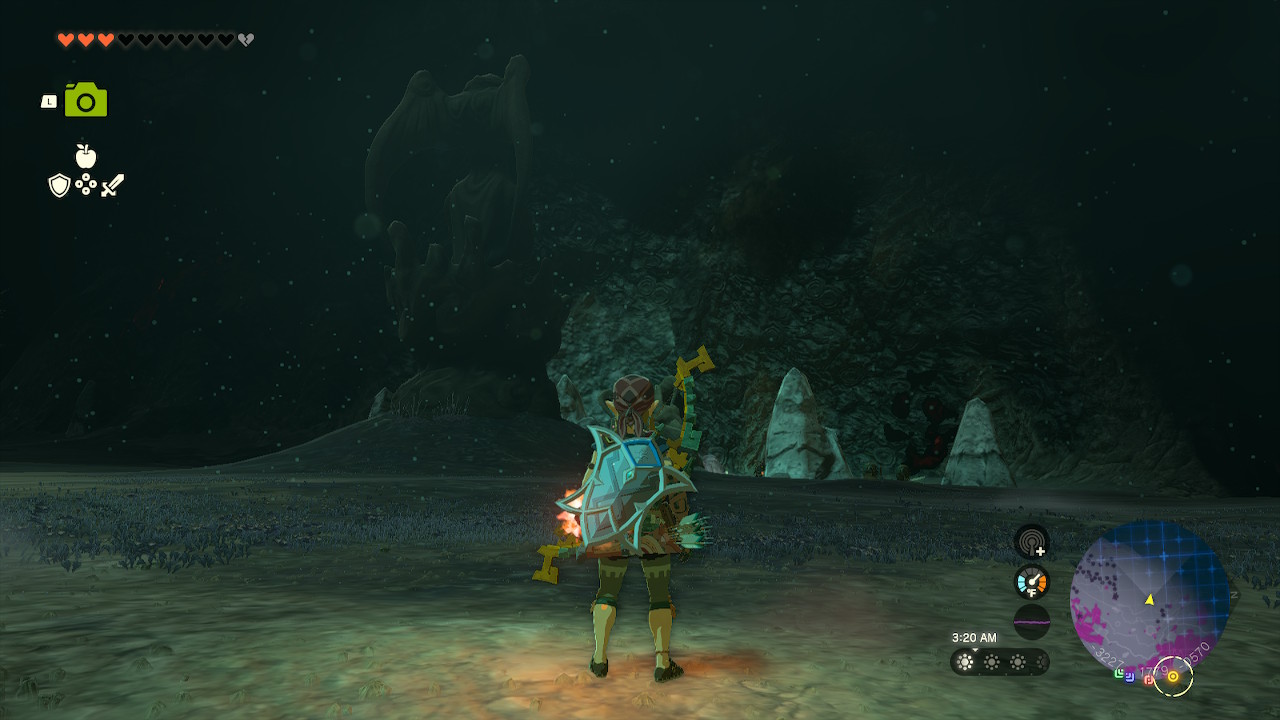 Link follows a path of statues that leads to a broken statue and an NPC in Zelda: Tears of the Kingdom