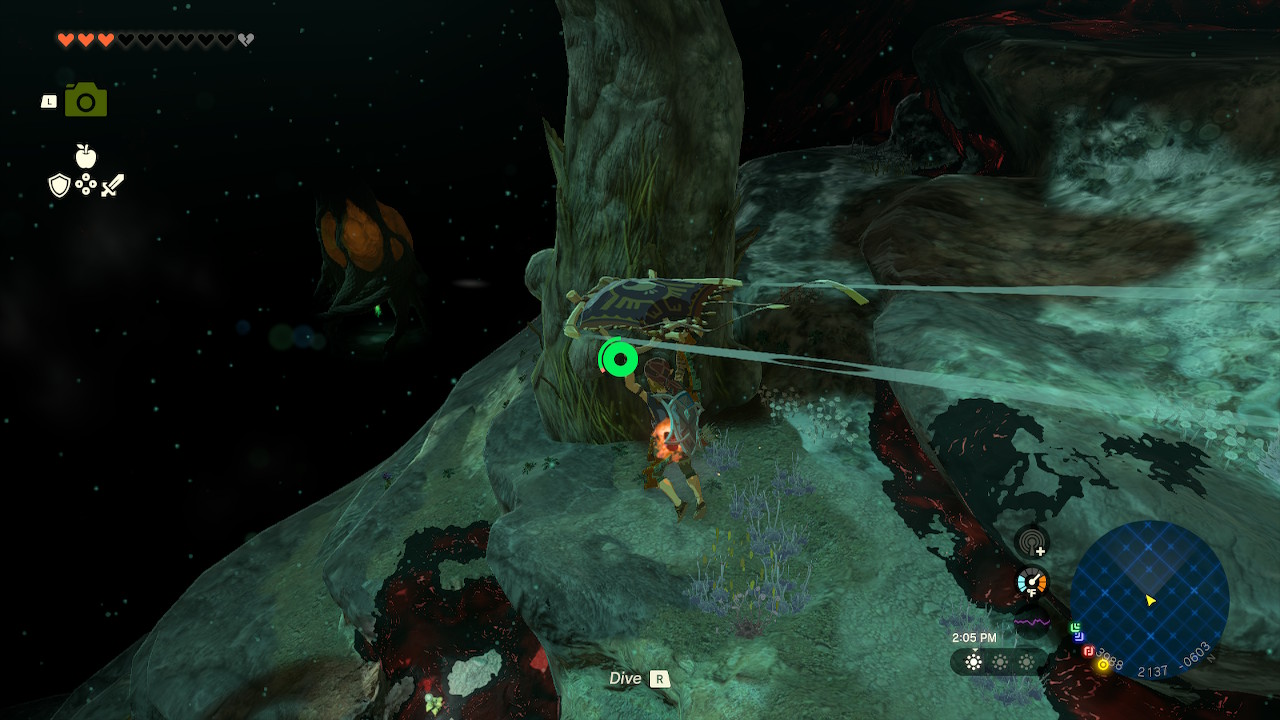 Link uses his glider to get over a cliff while moving towards a lightroot in Zelda: Tears of the Kingdom