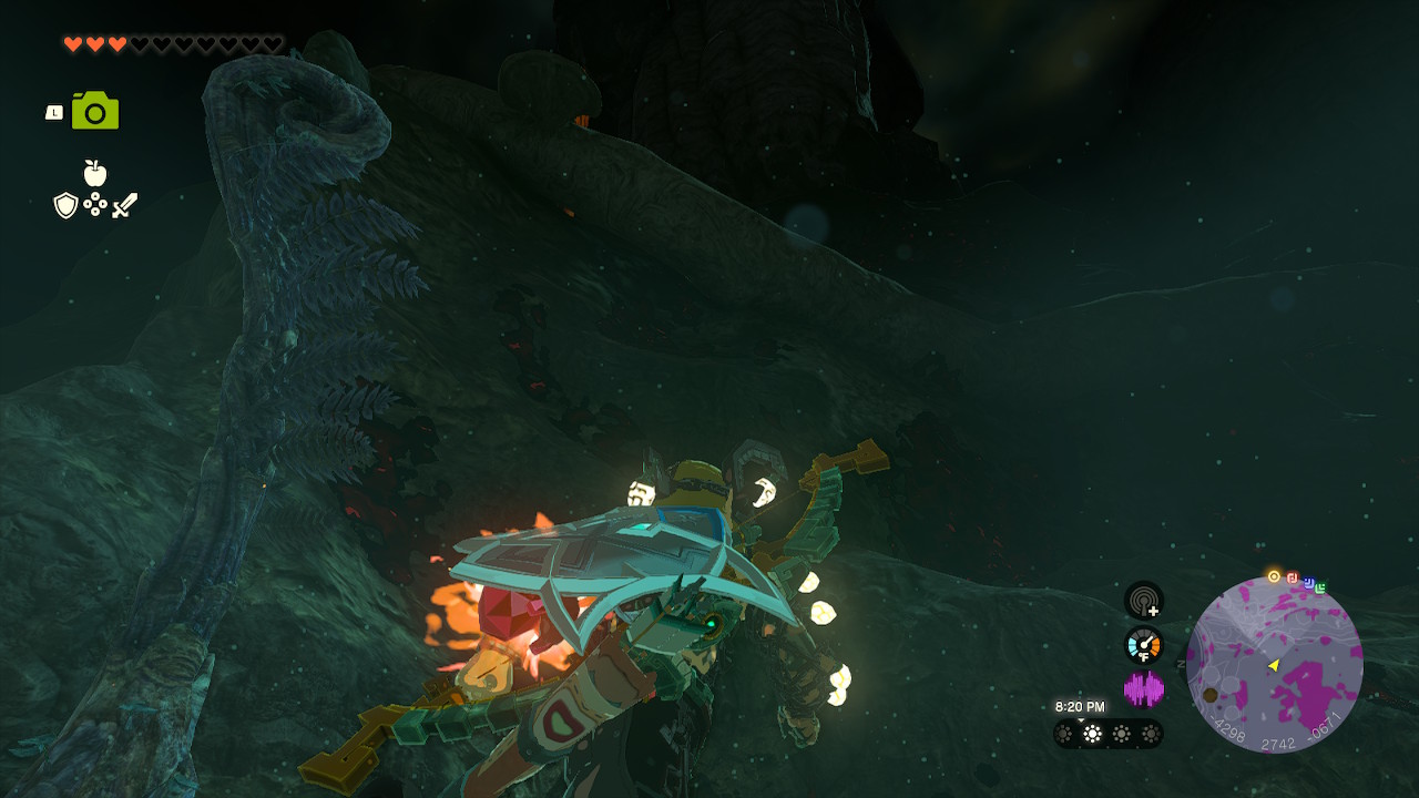 Link stands over a wall that leads to a massive root in Zelda: Tears of the Kingdom