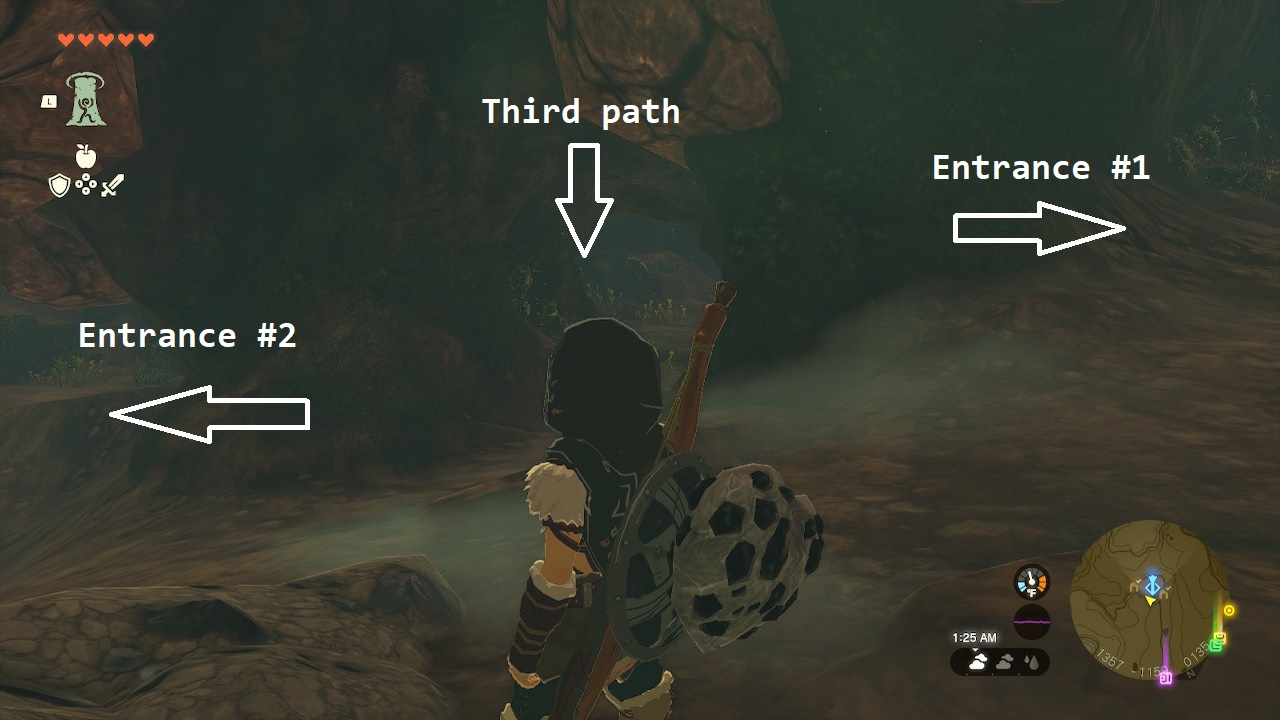 Link stands between both entrances to the cave on his right and left sides, with the third path right in front of him in Zelda: Tears of the Kingdom