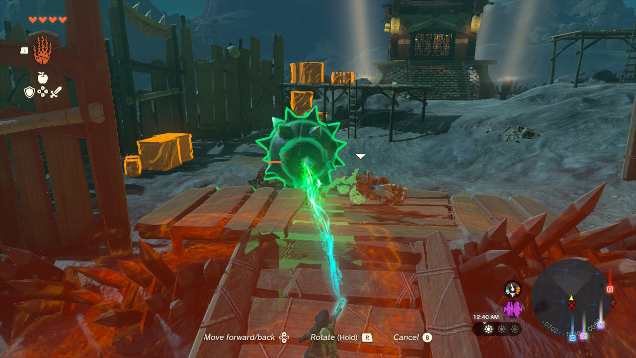Link uses Ultrahand on a spike ball, while other objects up for grabs are highlighted in orange in Zelda: Tears of the Kingdom