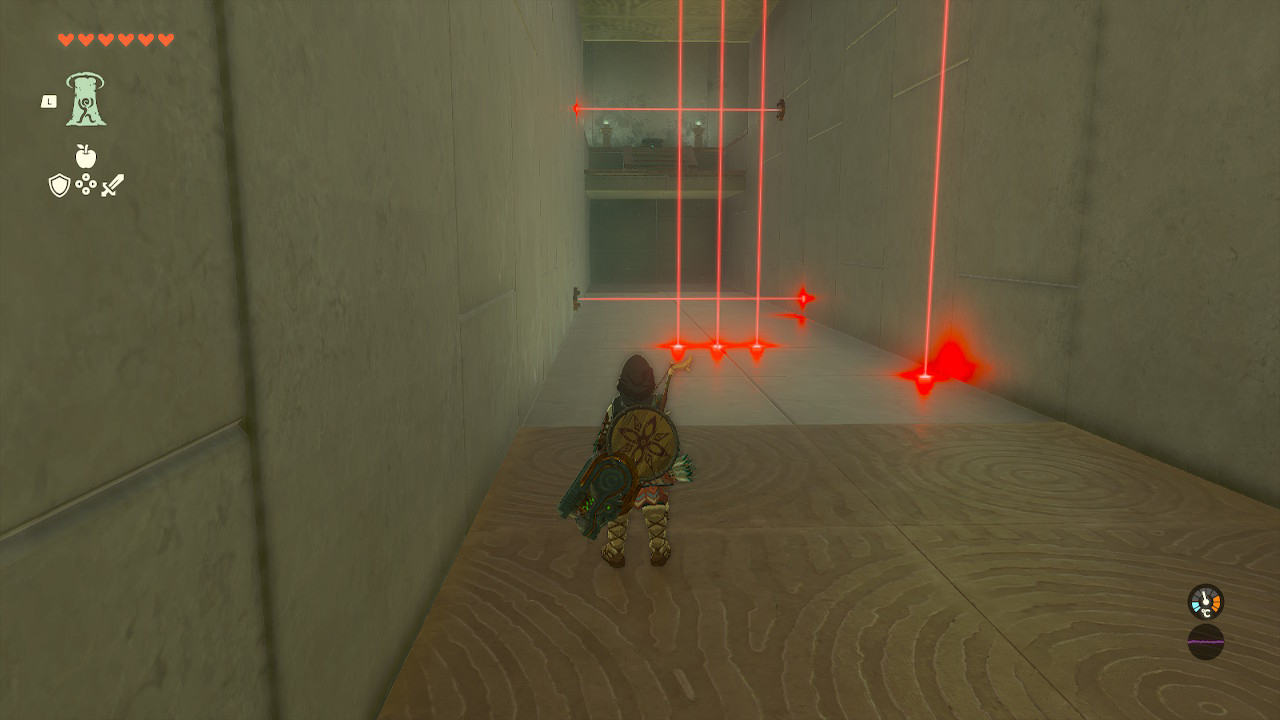 Link navigates a hallway full of lasers in the Orochium Shrine in Zelda Tears of the Kingdom.