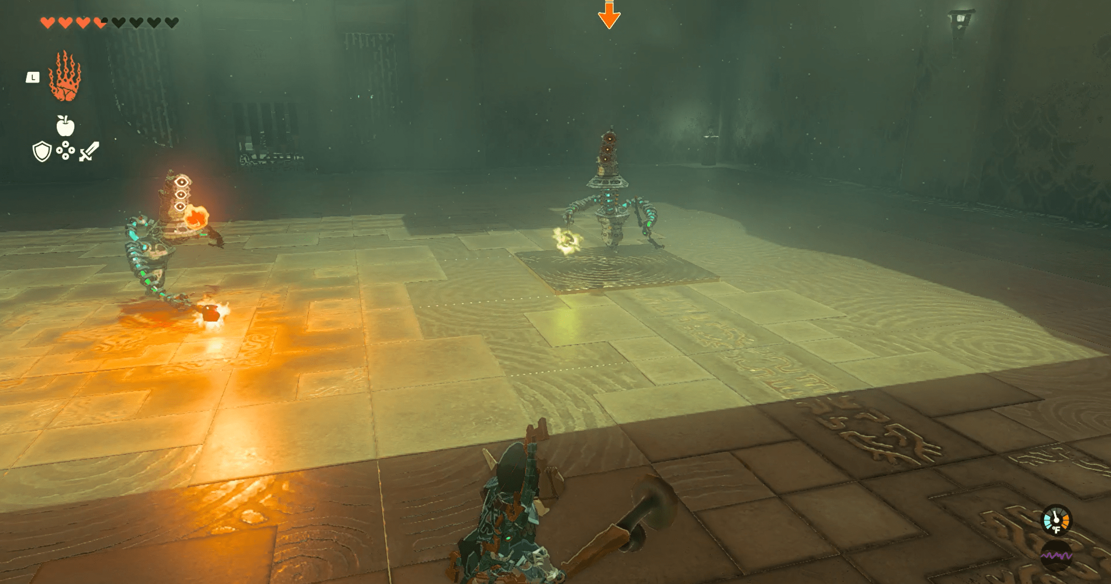 Two Constructs, each with different colored (red and yellow) projectiles in the Eshos Shrine of the Legend of Zelda: Tears of the Kingdom