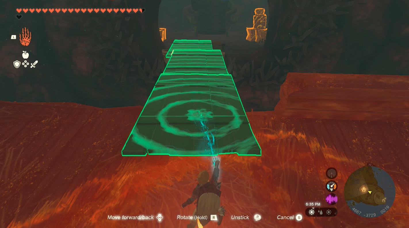 Link ultrahands some board into a bridge in the pirate cave in Zelda: Tears of the Kingdom