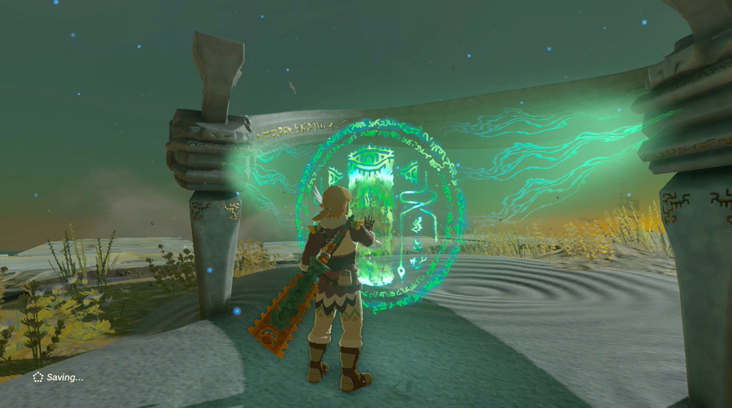 Link interacts with a shrine using his magical hand in The Legend of Zelda: Tears of the Kingdom.