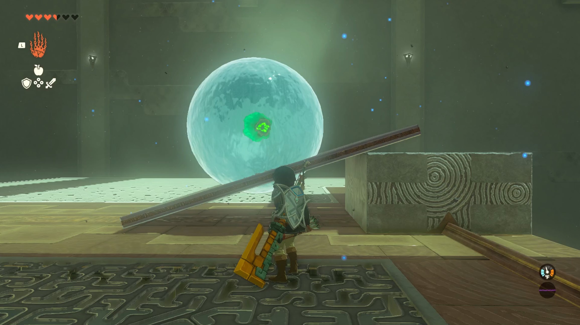 Link watches a large water orb roll up a ramp in front of him. The ramp is made of a slab leaning on a stone block.