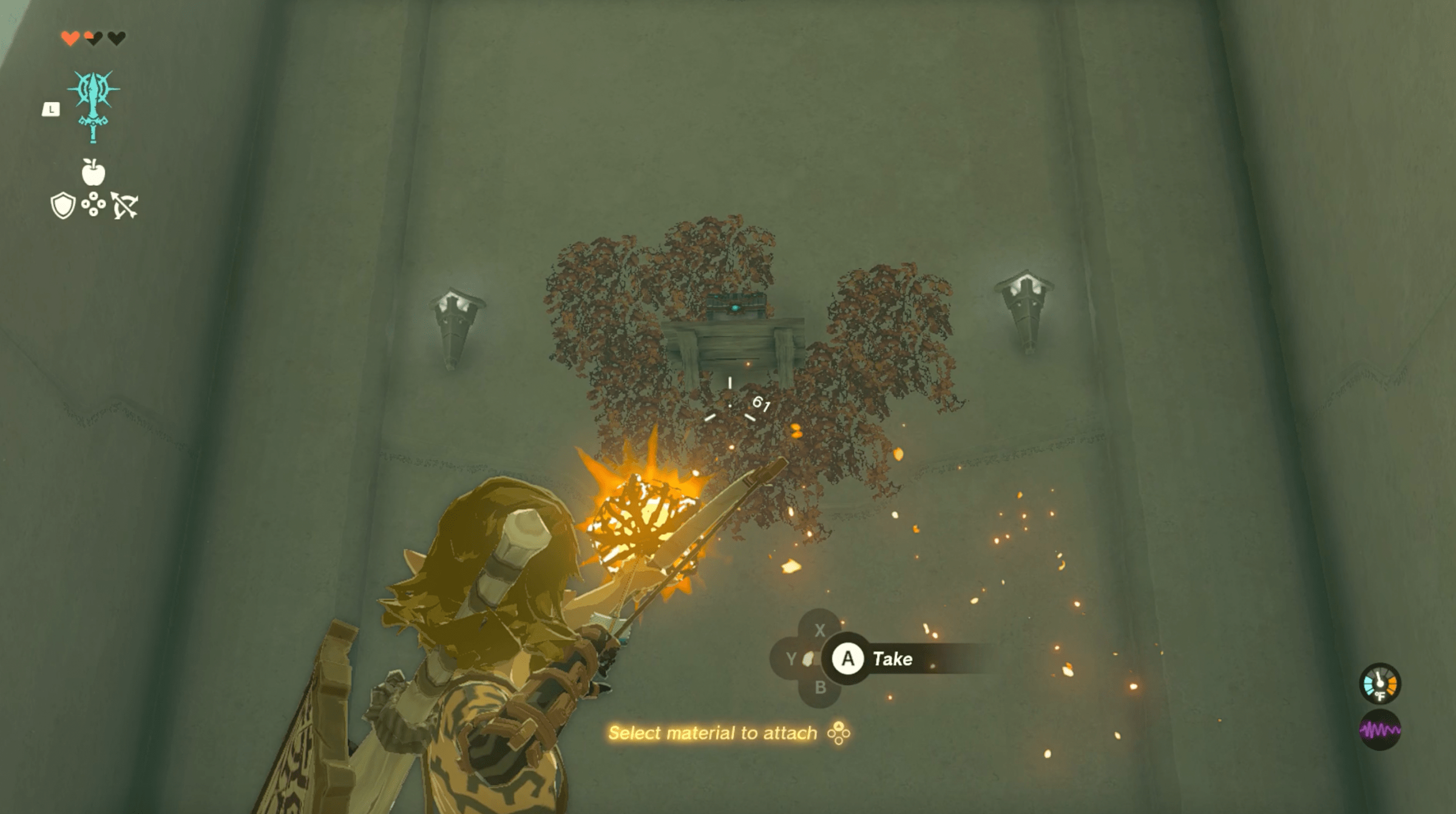 Link aims a fire arrow at a chest in the In-isa Shrine in Zelda: Tears of the Kingdom.