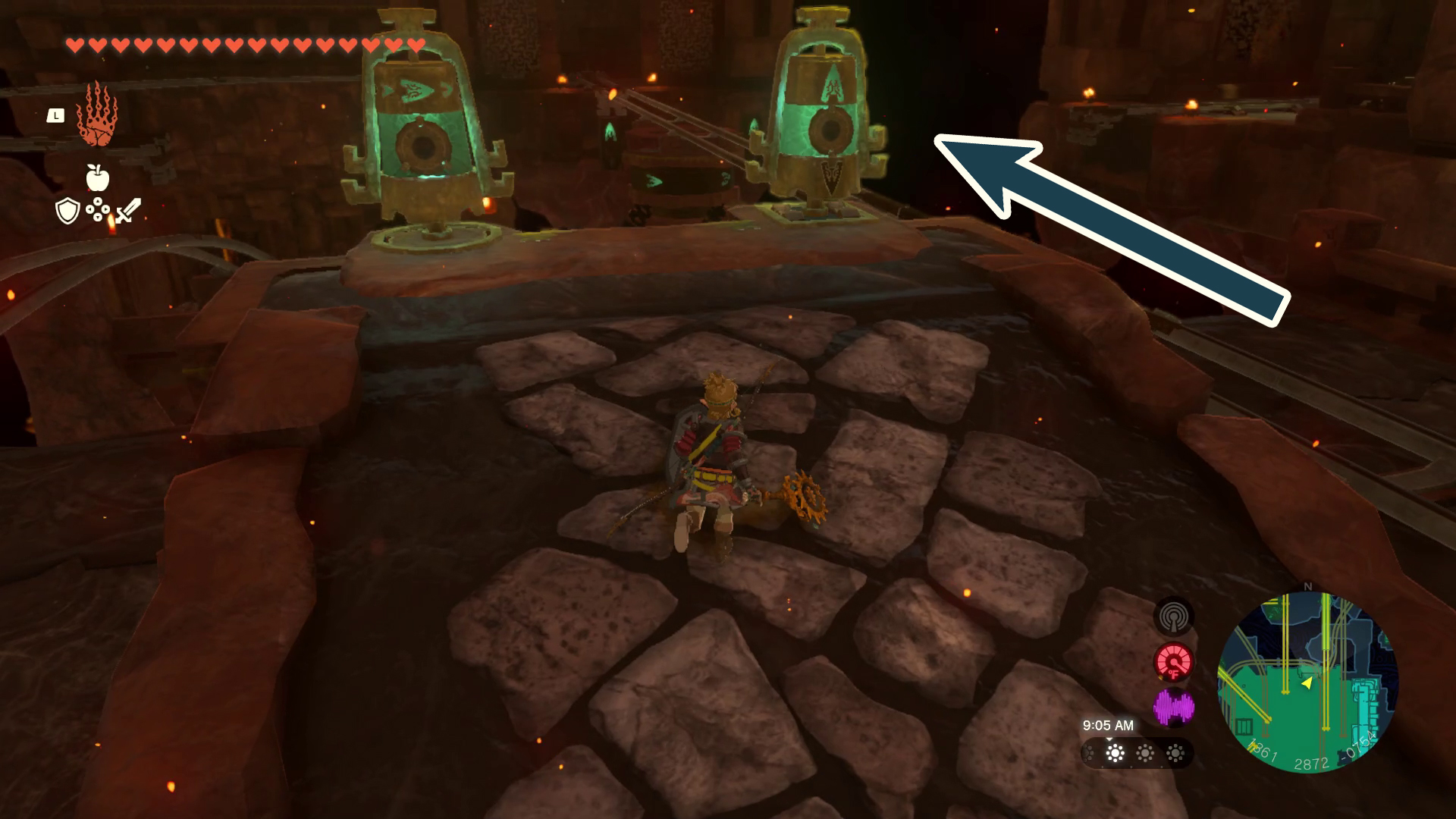 An arrow points a minecart track straight forward in Tears of the Kingdom