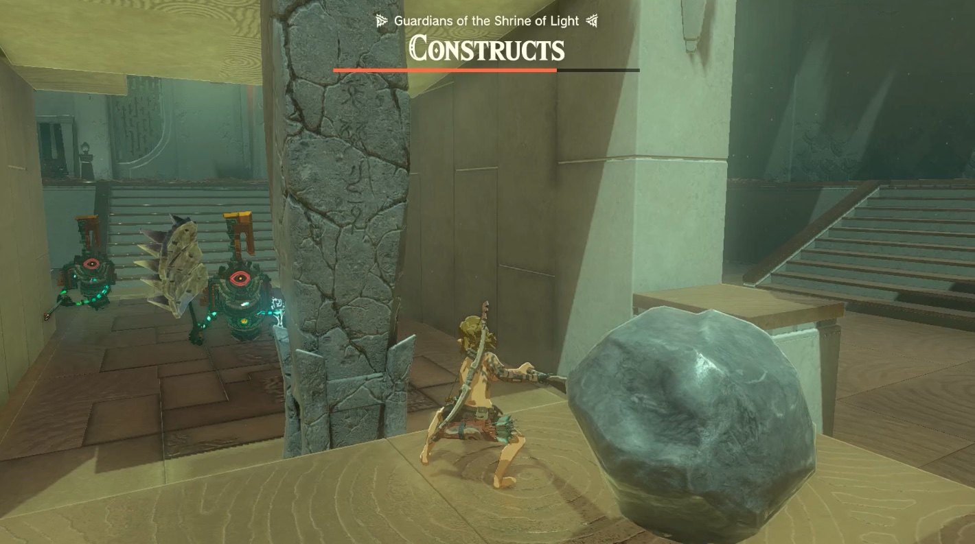 Link smashes a rock pillar with a stone hammer in the Otak Shrine ‘Proving Grounds: Traps’ quest in Zelda: Tears of the Kingdom
