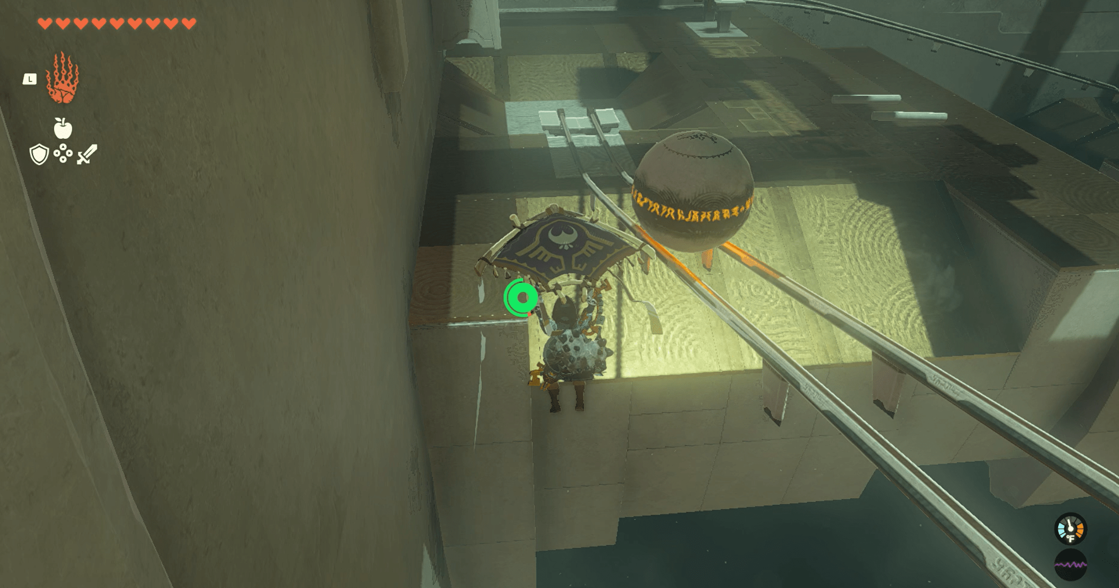 Link gliding alongside a ball on rails in The Legend of Zelda: Tears of the Kingdom